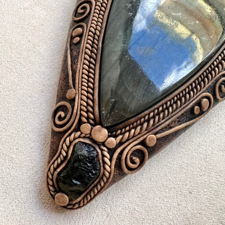 Crystal home decor wall art featuring Moldavite and Labradorite