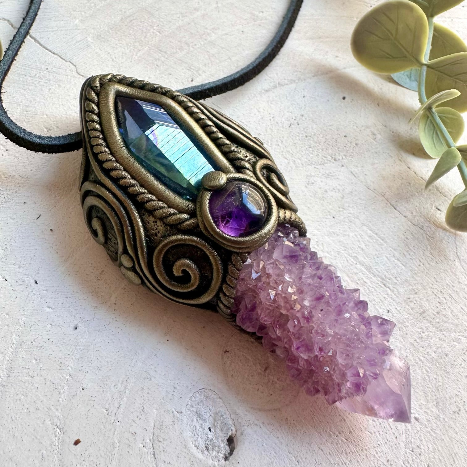 Handmade energy wand combining Deep Purple Spirit Quartz, Aqua Aura Quartz and Amethyst.
