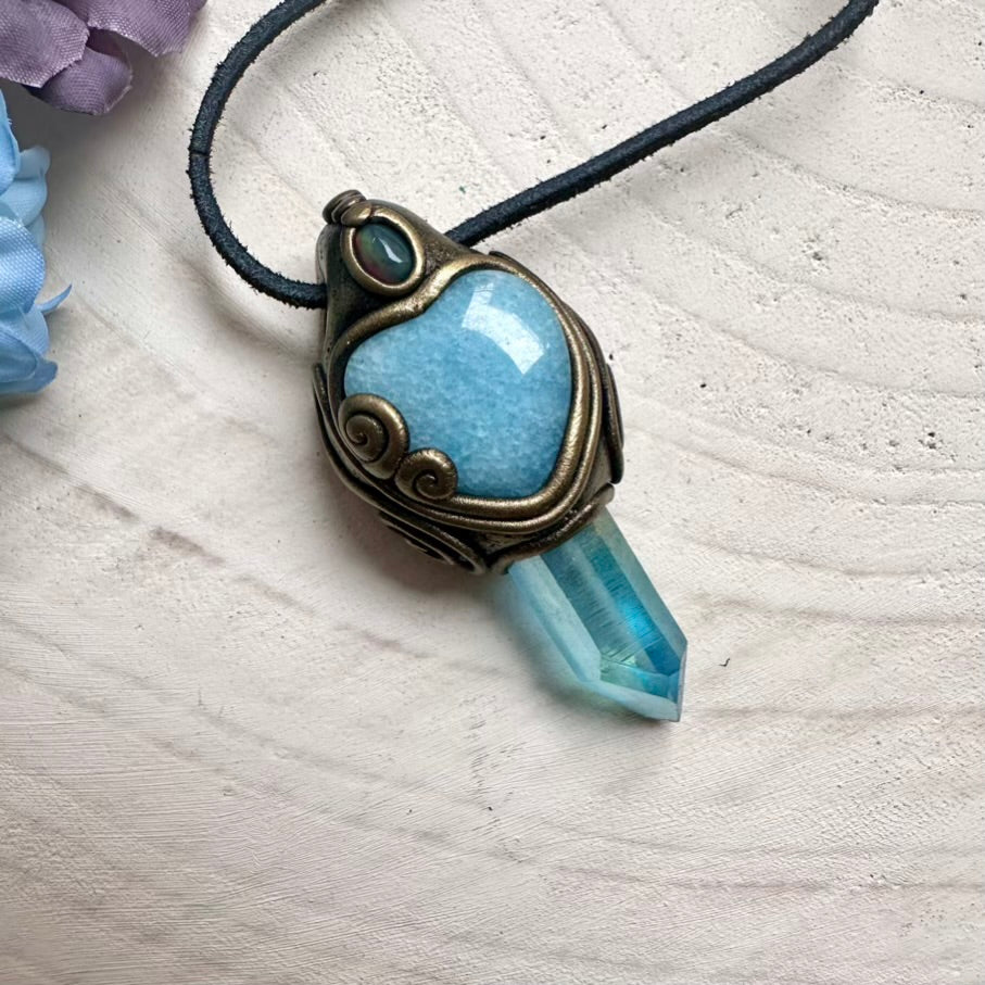 Ethically sourced Aquamarine heart gemstone paired with shimmering Aqua Aura Quartz and rare Ethiopian Black Opal, handcrafted necklace.