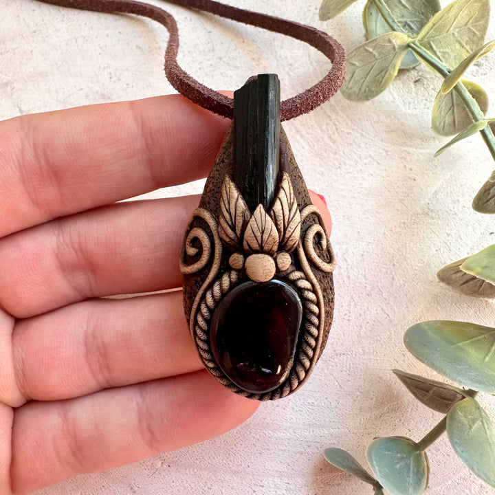 Metaphysical jewelry featuring protective and grounding crystals