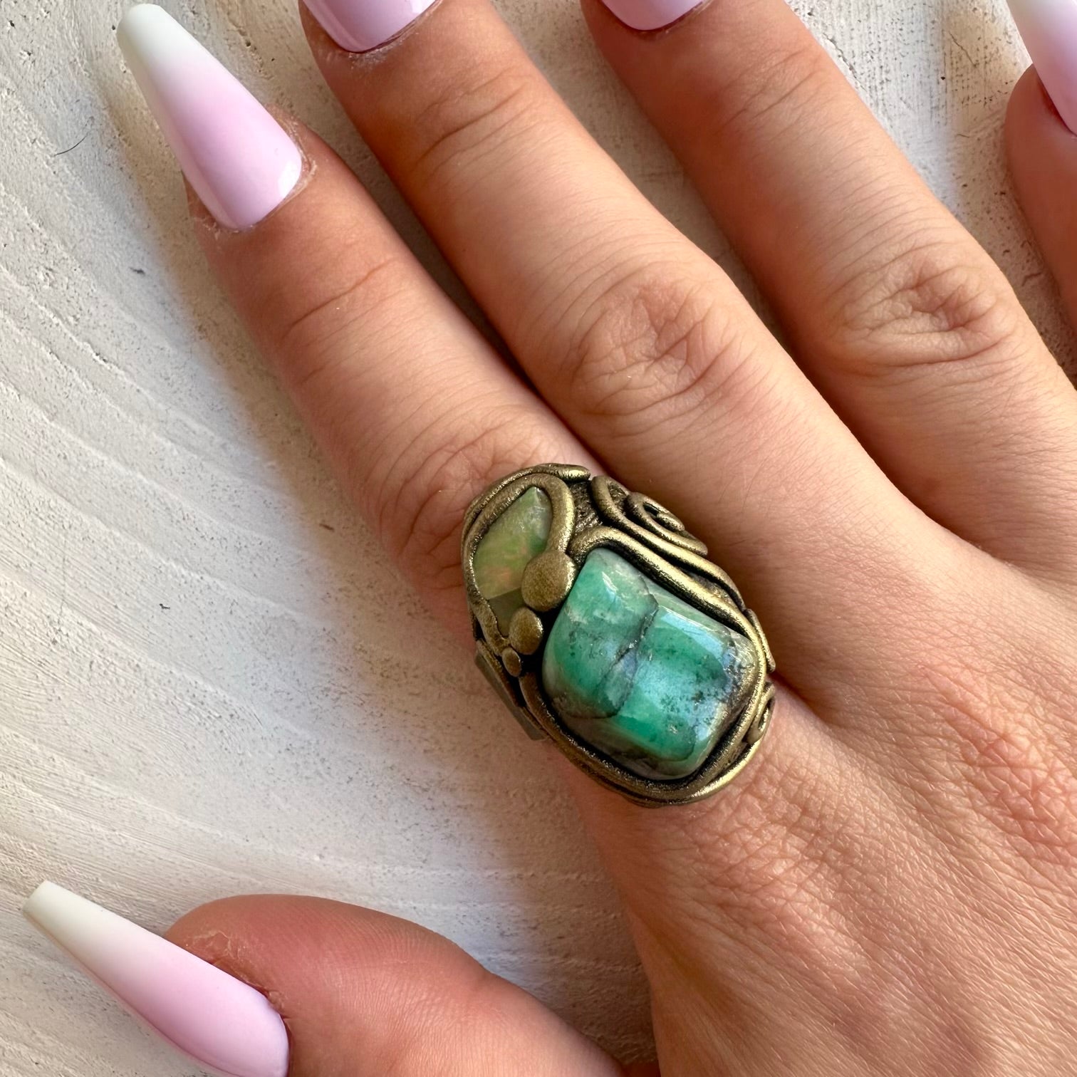 One of a kind handmade ring combining Emerald with shimmering Raw Ethiopian Opal.