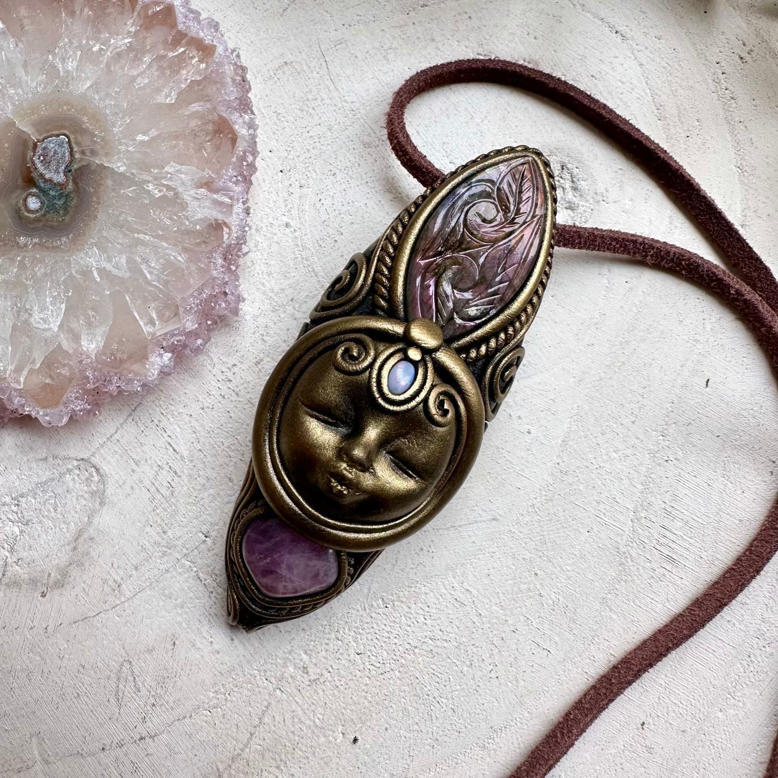 Curved labradorite paired with lavender quartz in a goddess necklace
