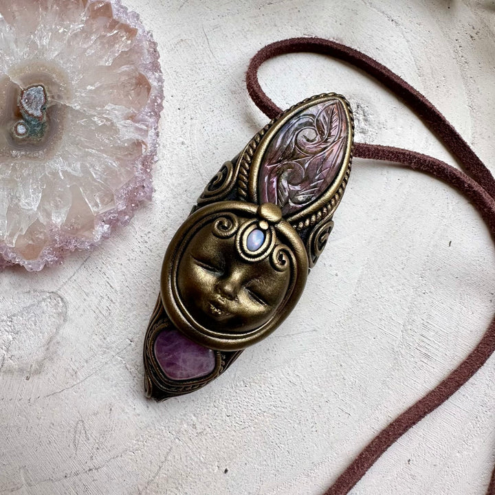 Curved labradorite paired with lavender quartz in a goddess necklace