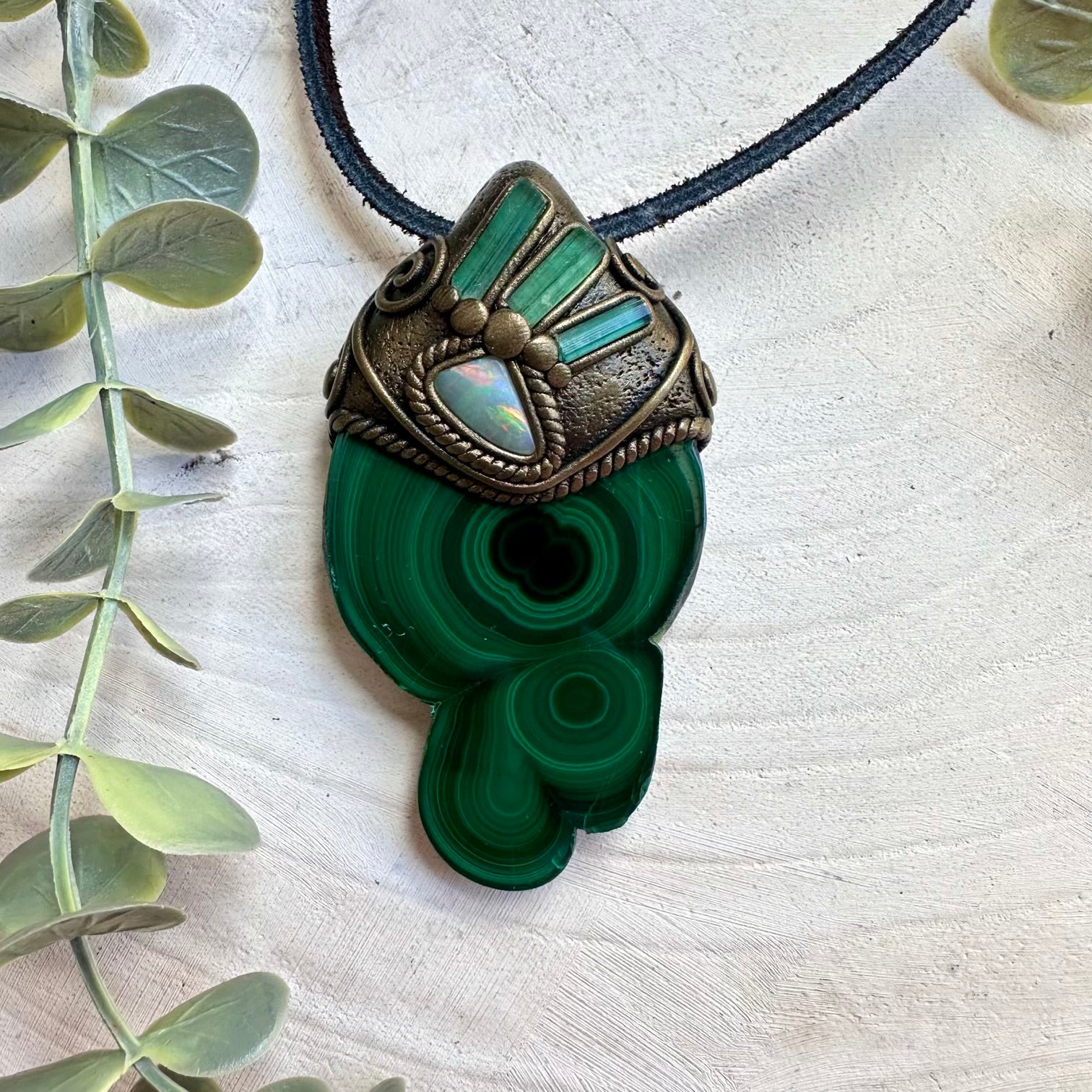 Malachite stalactite paired with green tourmaline and opal