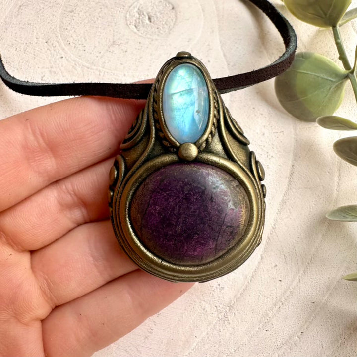 Purpurite gemstone paired with rainbow moonstone in a handmade necklace