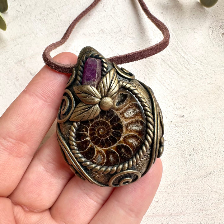 Spiritual jewelry necklace handcrafted with healing gemstones for witches, healers, and fantasy jewelry lovers.