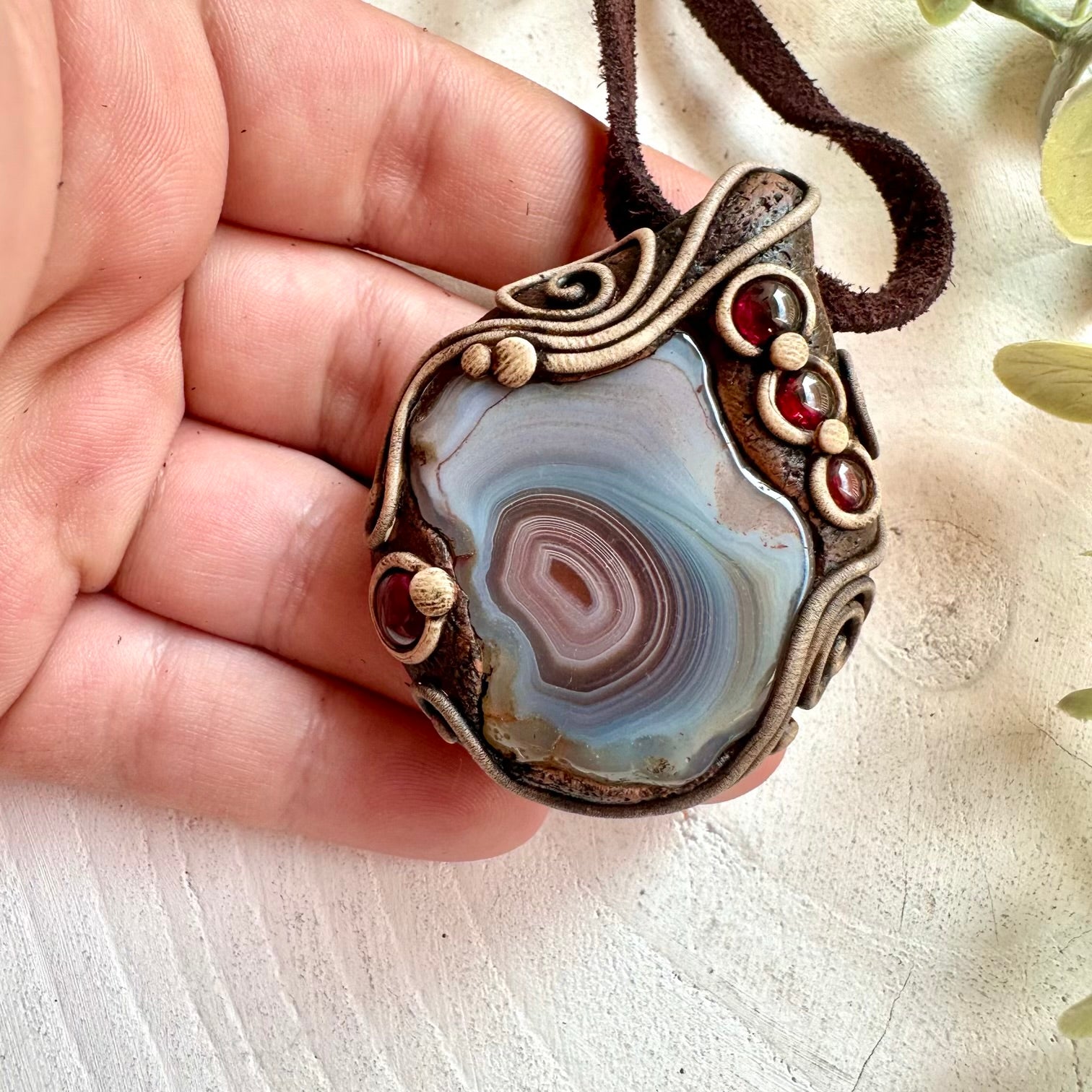 Premium artisan healing stone necklace with Botswana Agate and Rhodolite Garnet gemstones.