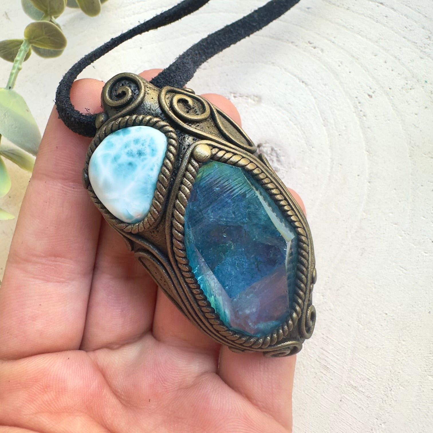 Metaphysical jewelry featuring Larimar and Aqua Aura Quartz