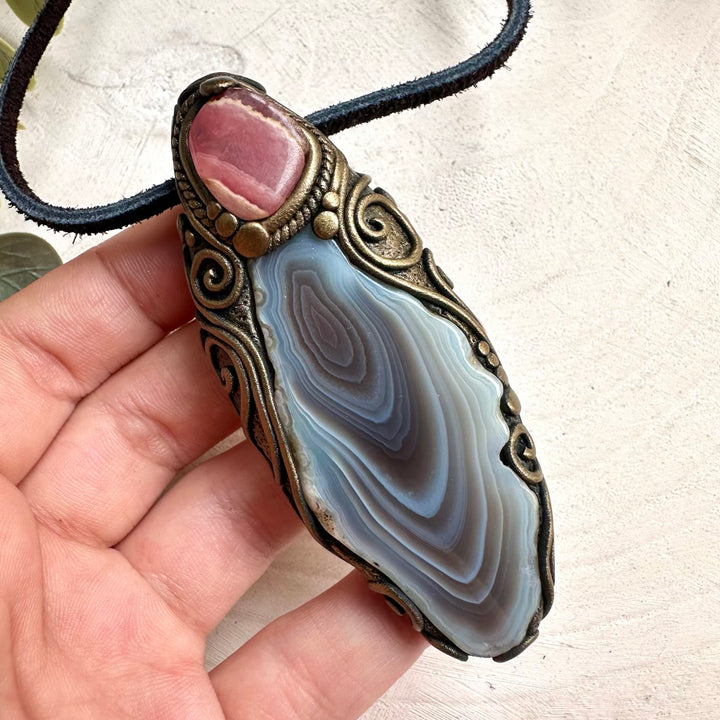 Crystal jewelry for love and emotional healing with rhodochrosite and Botswana agate stones