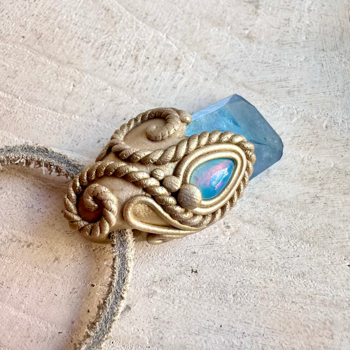 Handmade healing jewelry showcasing Aqua Aura Quartz with beautiful Blue Ethiopian Opal accents.
