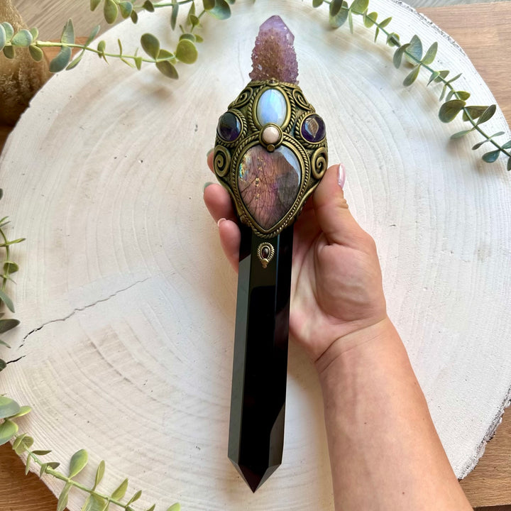 One of a kind metaphysical crystal wand handcrafted with Black Obsidian, Rainbow Moonstone and Amethyst.