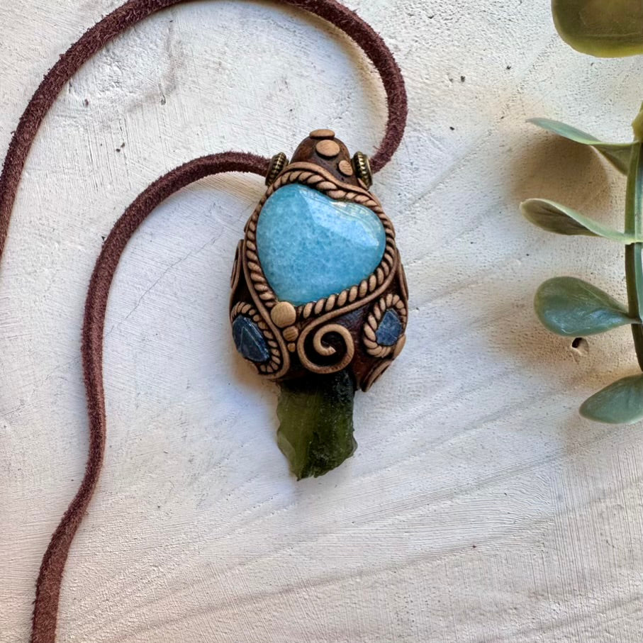 Healing crystal pendant necklace with aquamarine heart and moldavite