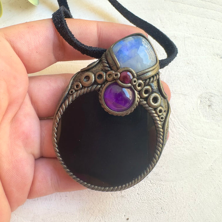 Natural gemstone jewelry featuring Rainbow Moonstone and Obsidian