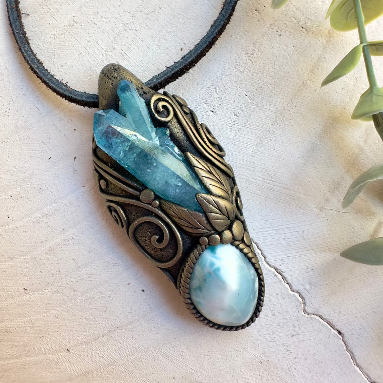 Healing crystal pendant featuring Aqua Aura Quartz and Larimar