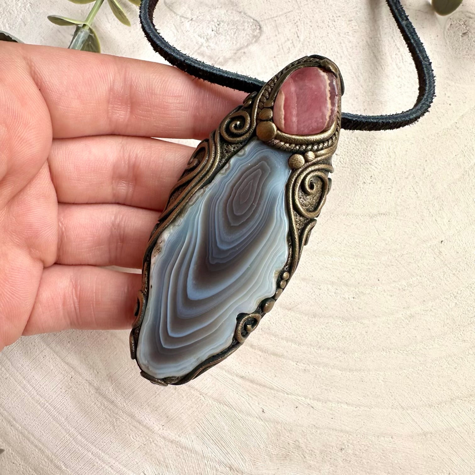 Mineral specimen inspired crystal necklace with raw Botswana agate and rhodochrosite pendant