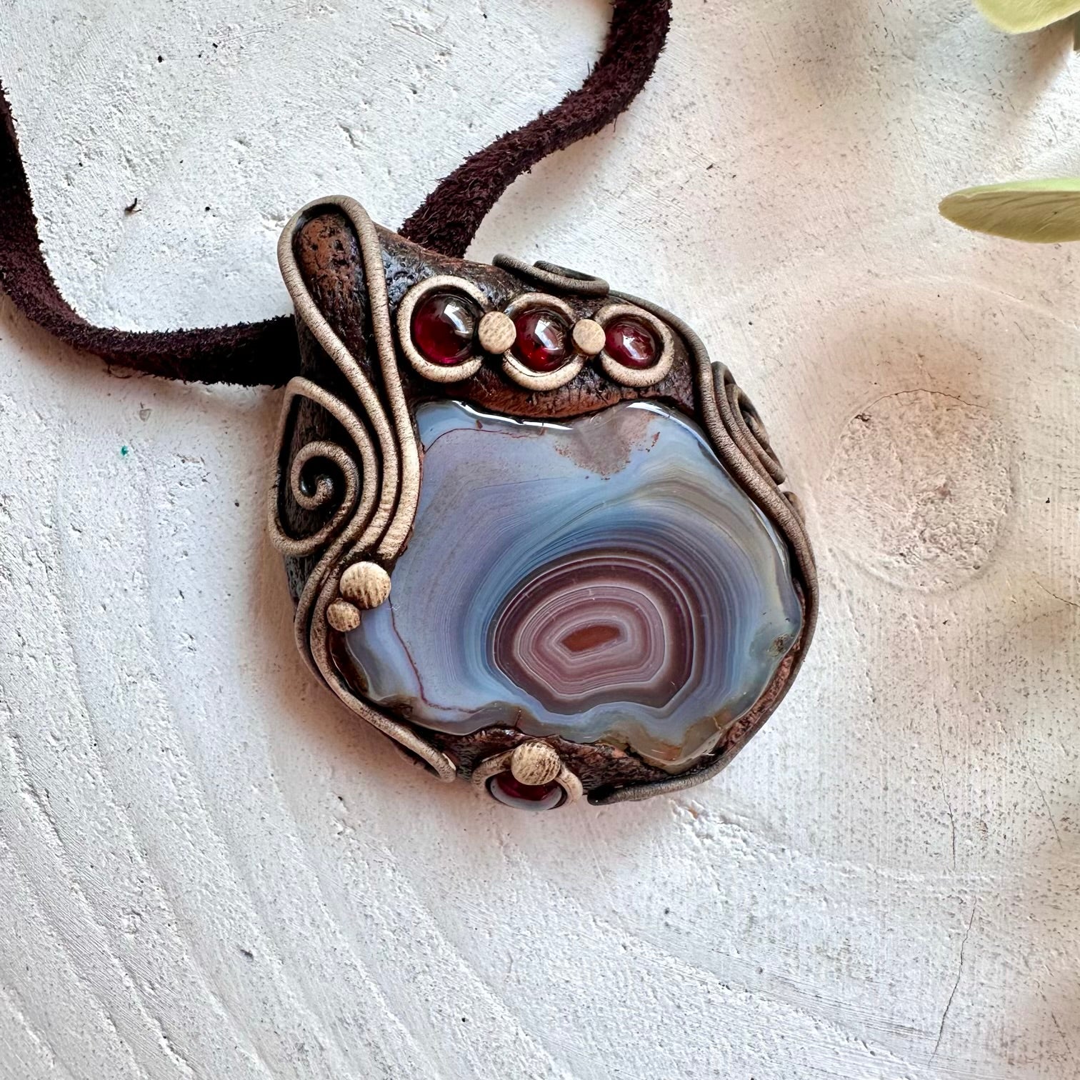Unisex gemstone pendant necklace with Botswana Agate and Rhodolite Garnet natural crystals.