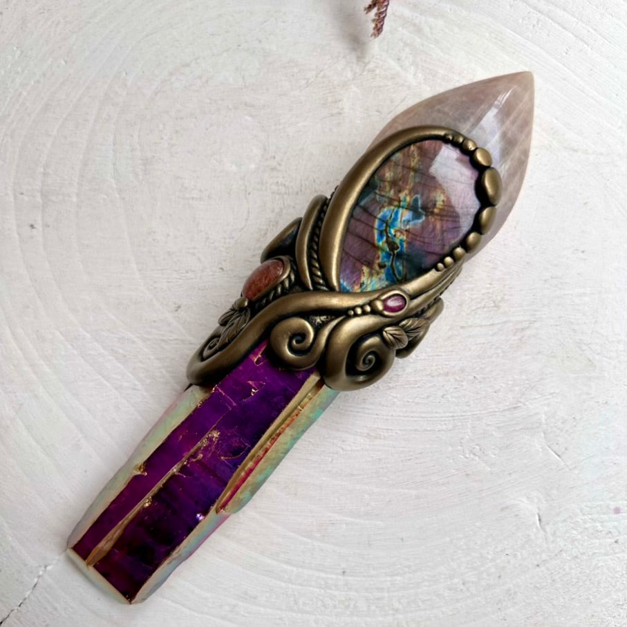 Crystal wand featuring Moonstone flame, Ruby and Sunset Aura Quartz