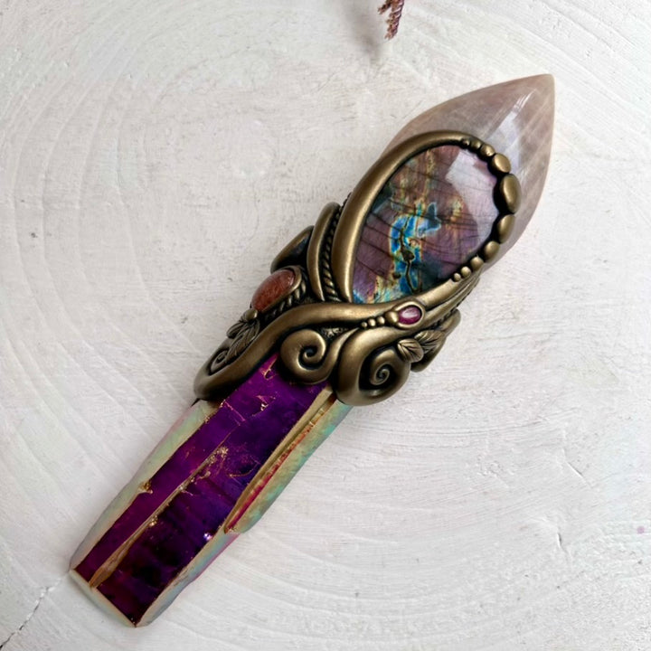 Crystal wand featuring Moonstone flame, Ruby and Sunset Aura Quartz
