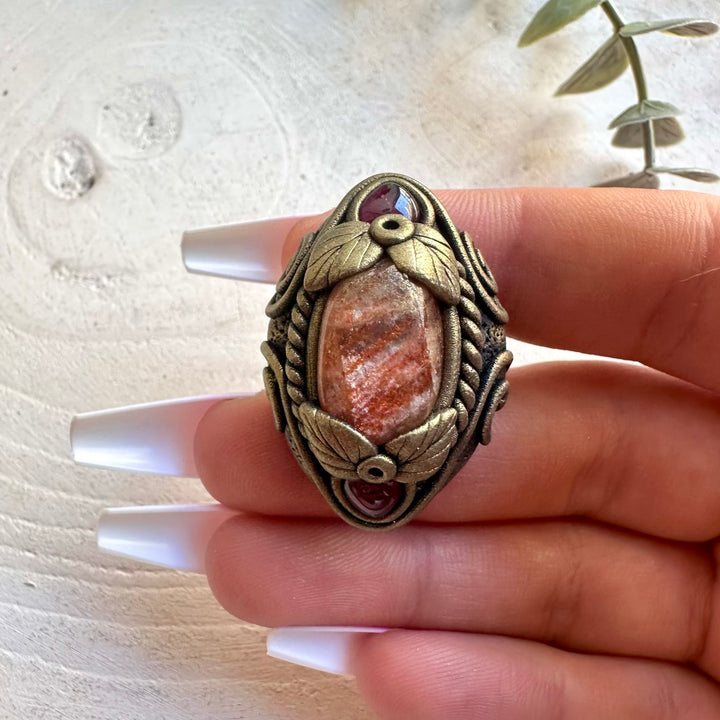 Handmade statement ring with Sunstone and Rhodolite Garnet natural gemstones.
