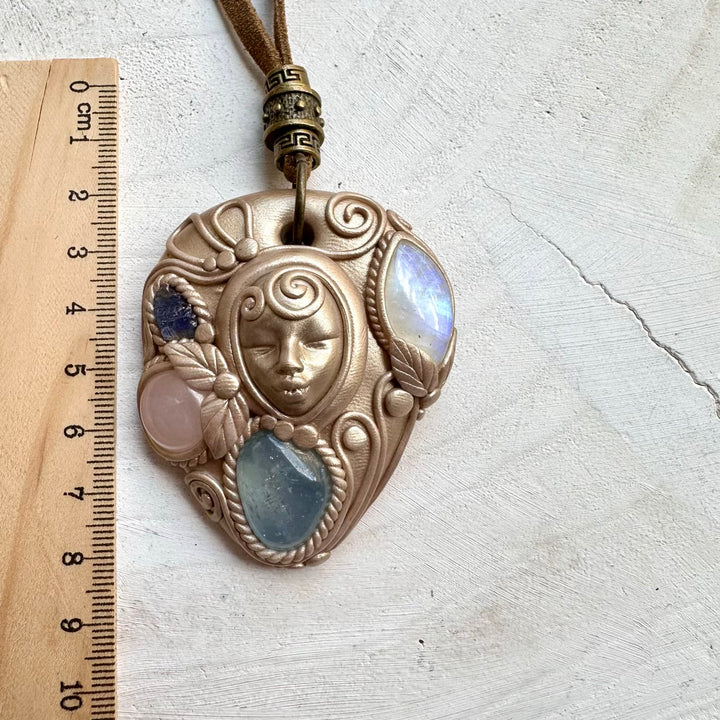 Healing crystal goddess pendant with rose quartz and tanzanite