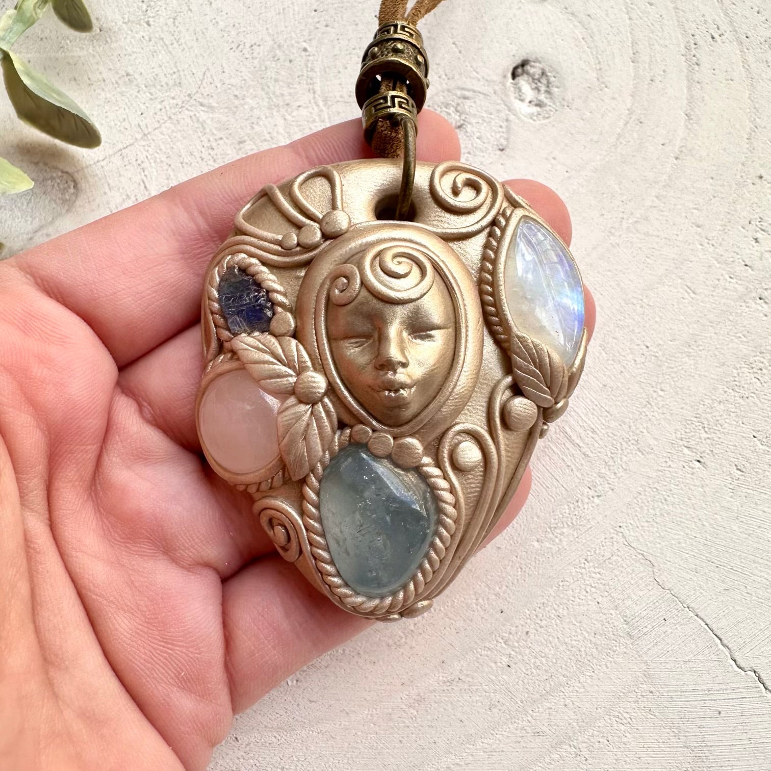 Goddess clay necklace with celestite rainbow moonstone rose quartz and tanzanite