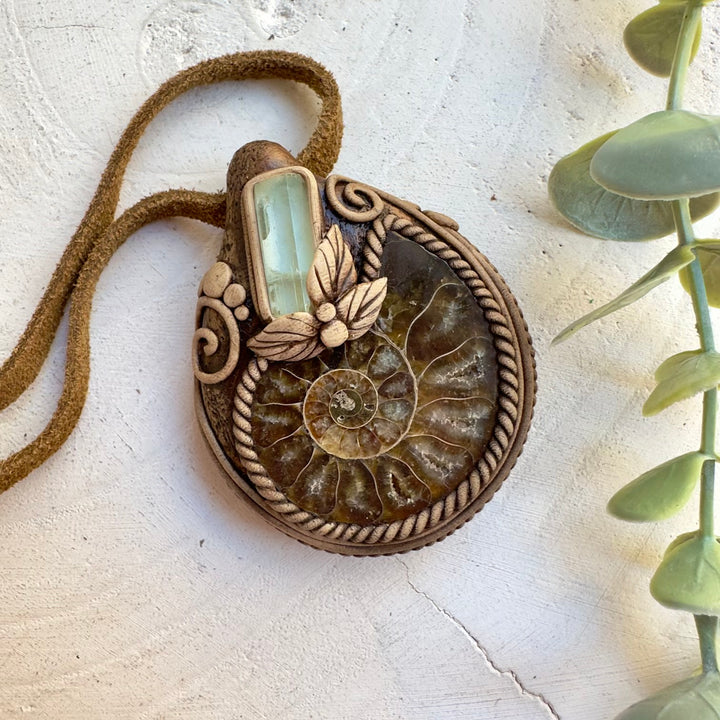 Ocean inspired crystal jewelry with natural fossil centerpiece