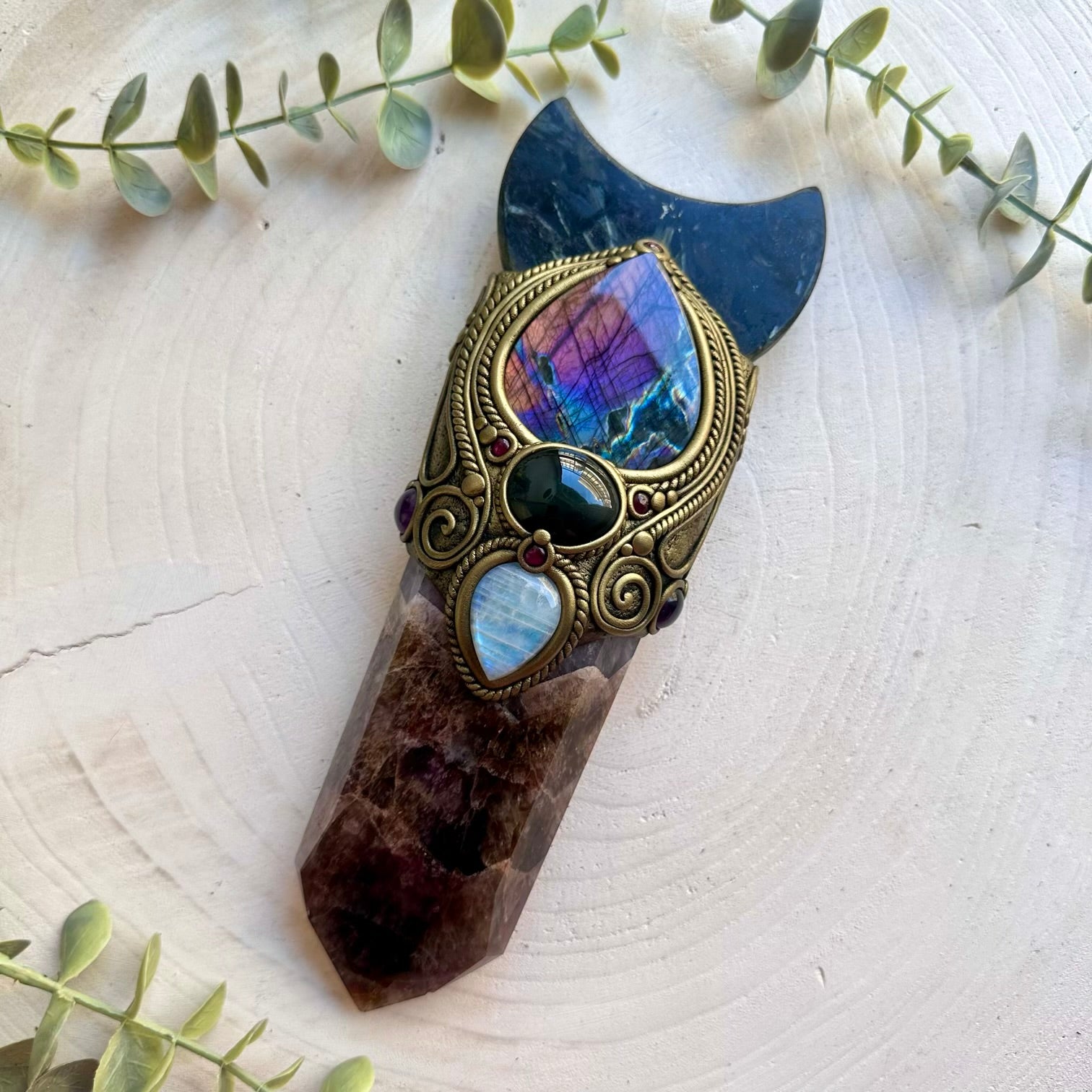Super Seven Quartz crystal wand handcrafted with Astrophyllite Moon, Purple Labradorite, Rainbow Obsidian, Rainbow Moonstone, Amethyst and Rhodolite Garnet.
