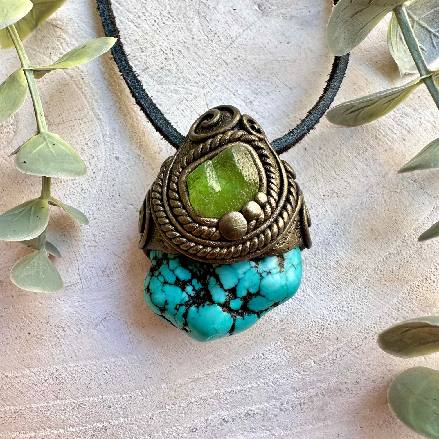 Handmade unisex necklace featuring natural Turquoise and Peridot gemstones.