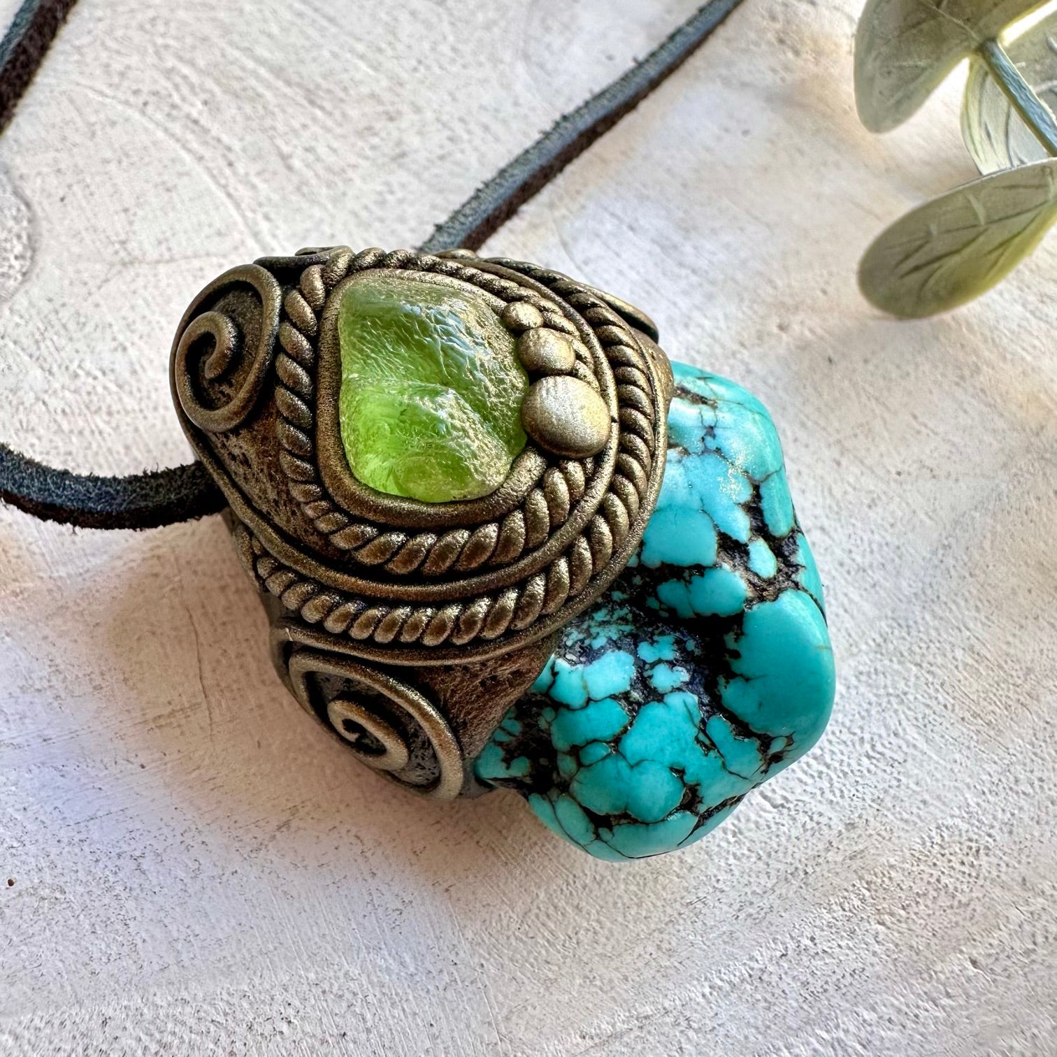 Unique unisex jewelry featuring Turquoise and vibrant green Peridot gemstones.