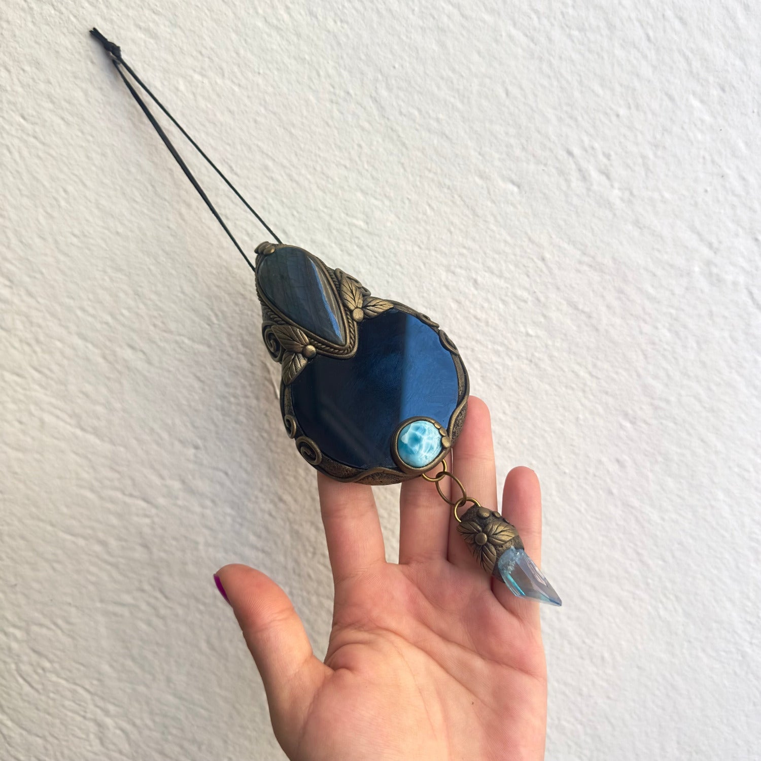 Fantasy inspired crystal wall hanging with Aqua Aura Quartz