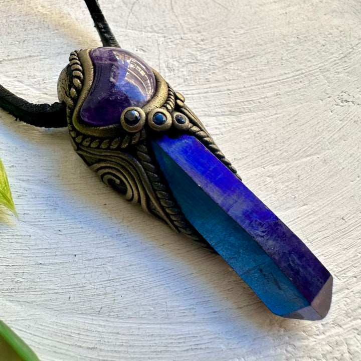 Cobalt Aura Quartz pendant paired with Amethyst moon and Sapphire gemstone