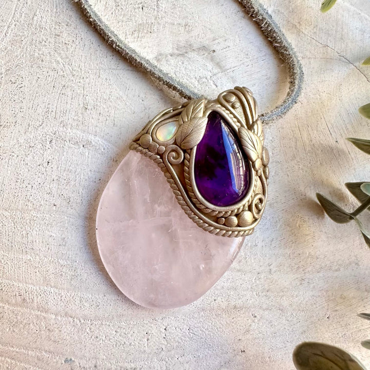 Handmade crystal jewelry combining soft pink Rose Quartz with purple Amethyst and Ethiopian Opal.