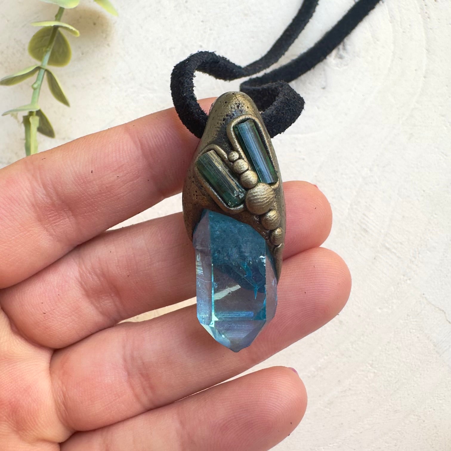 Unique handcrafted crystal necklace with natural stones