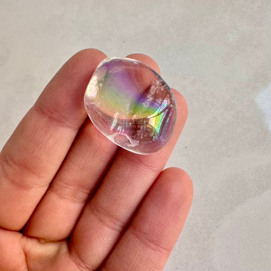 Polished aura quartz crystal for peace and high vibration
