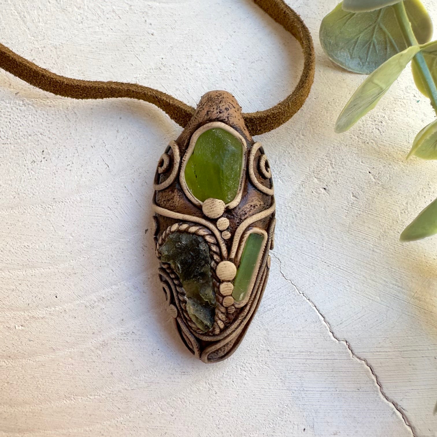 Fantasy jewelry necklace featuring natural crystal gemstones