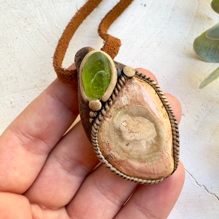 Green Peridot crystal pendant with Petrified Wood