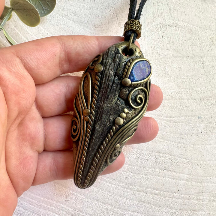Handmade Black Kyanite and Lapis Lazuli unisex pendant necklace, a one of a kind crystal talisman designed for grounding, protection, intuition and inner wisdom. Artisan gemstone jewelry crafted with genuine natural crystals, perfect for those who appreciate unique spiritual and minimalist statement pieces.