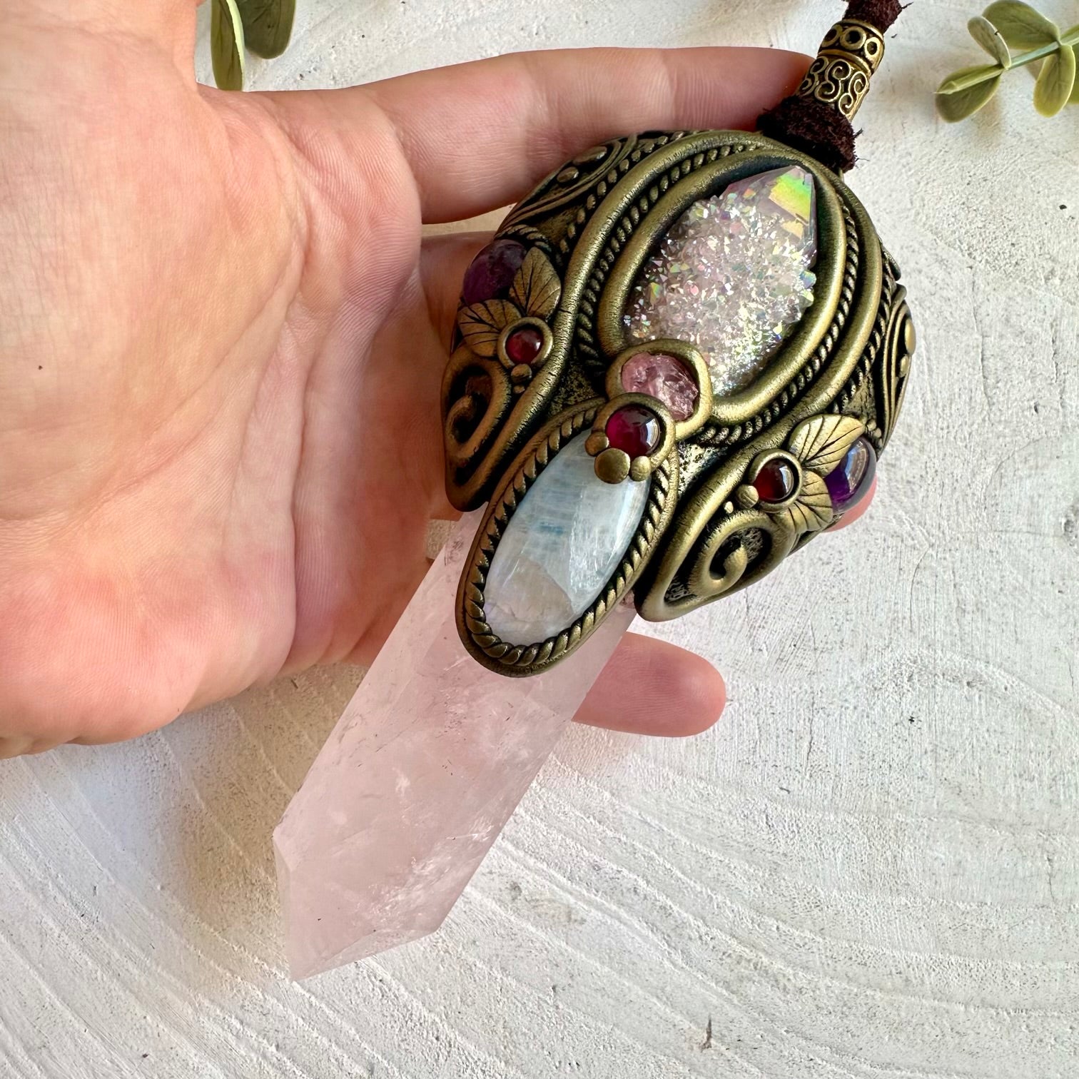 One of a kind handmade Rose Quartz healing crystal wand pendant necklace featuring Angel Aura Spirit Quartz, Moonstone, Amethyst, Gemmy Rhodochrosite and Rhodolite Garnet, a one of a kind energy and ritual tool designed for self-love, emotional healing, intuition, spiritual growth and heart-centered transformation.