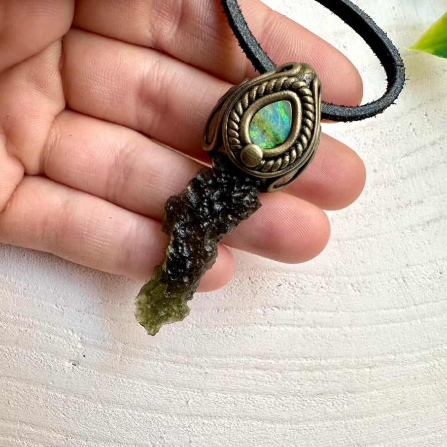 Spiritual jewelry made with Moldavite and Boulder Opal