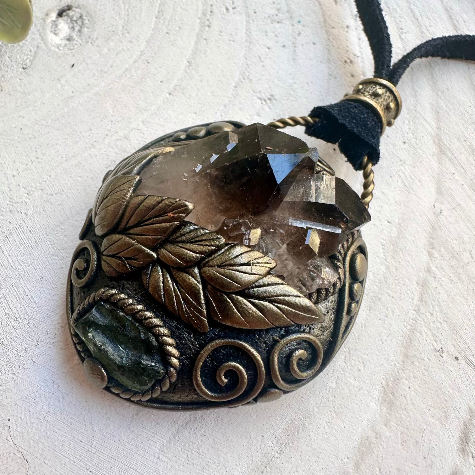 Healing stone pendant featuring Smoky Quartz and Moldavite crystals