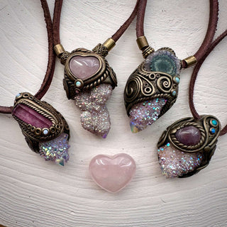 angel aura spirit quartz pendant on a natural background