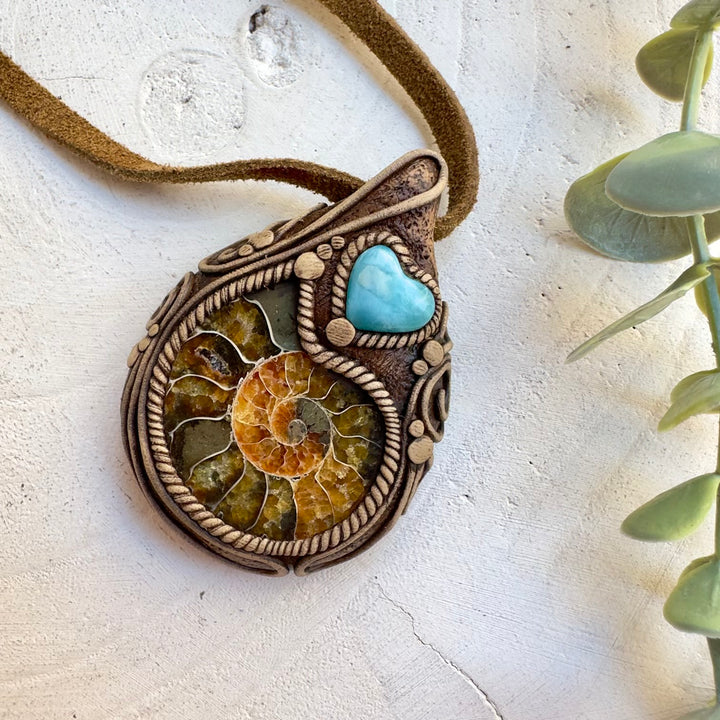 Natural ammonite fossil necklace with heart shaped Larimar