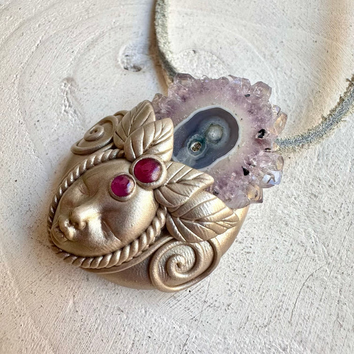 Protection amulet crystal necklace with amethyst stalactite and garnet gemstones