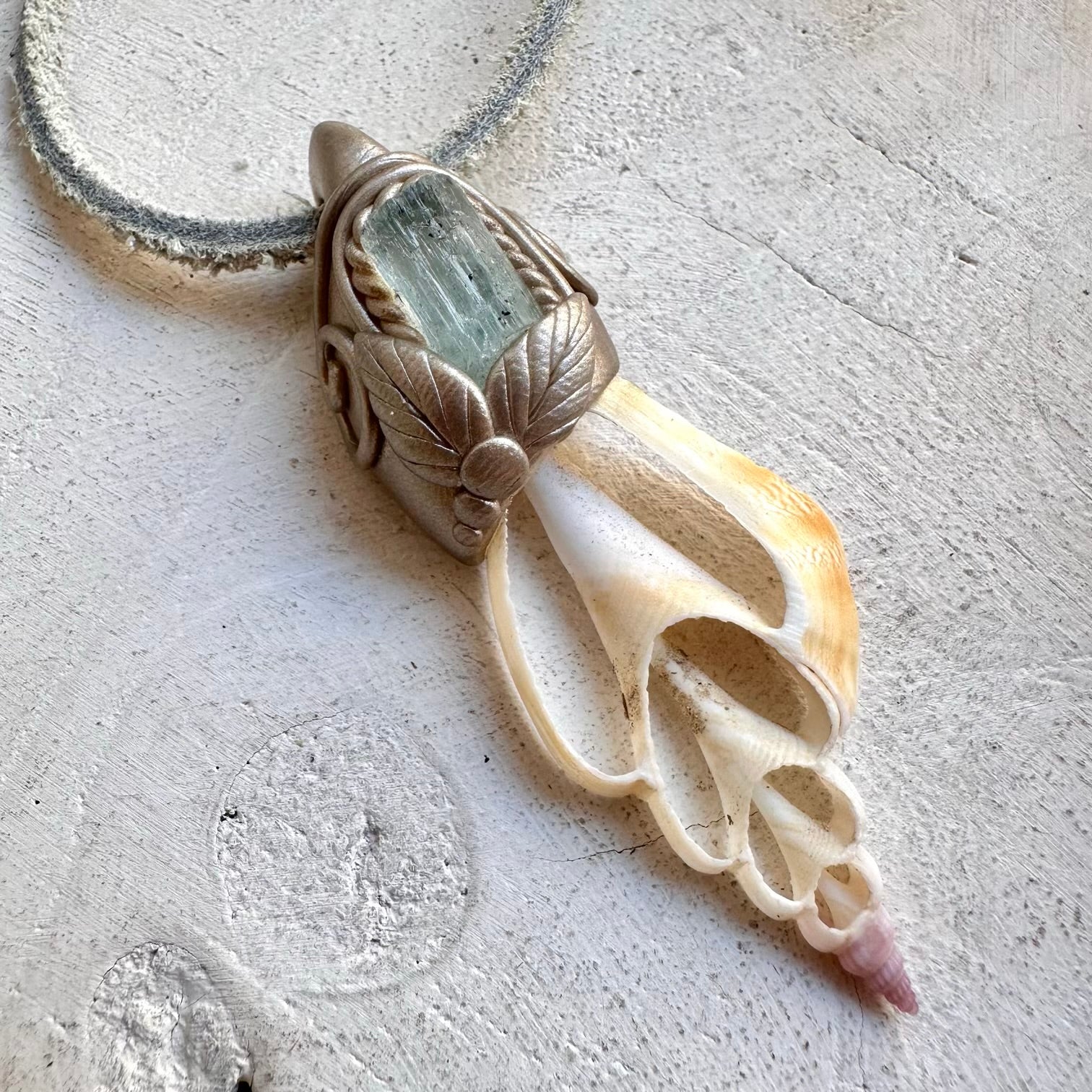Protection amulet crystal necklace with aquamarine and seashell slice