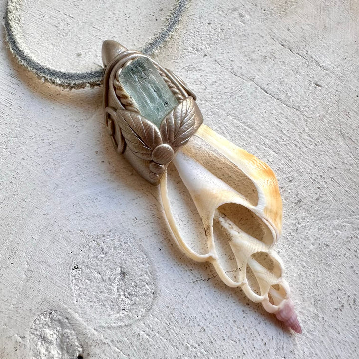 Protection amulet crystal necklace with aquamarine and seashell slice