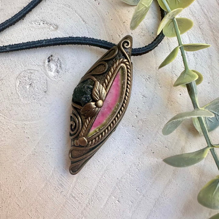 Spiritual jewelry combining watermelon tourmaline and moldavite