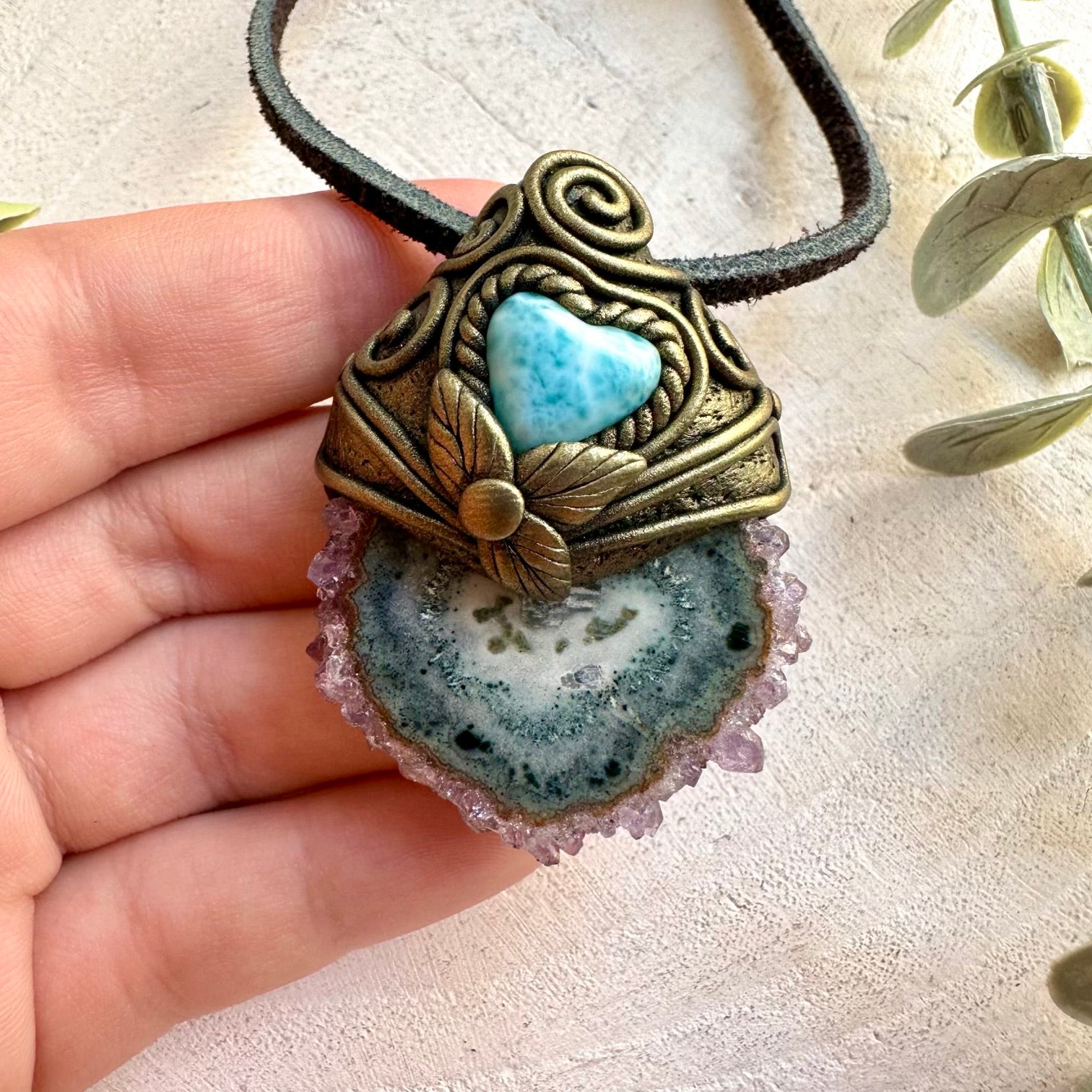 Unique crystal necklace featuring the natural texture of Amethyst Stalactite and soft blue Larimar.