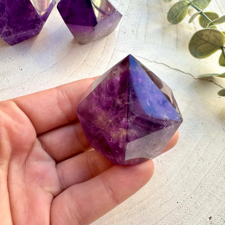 Beautiful polished amethyst crystal point mineral