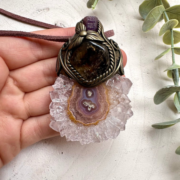 Handmade necklace featuring amethyst stalactite citrine and ruby stones