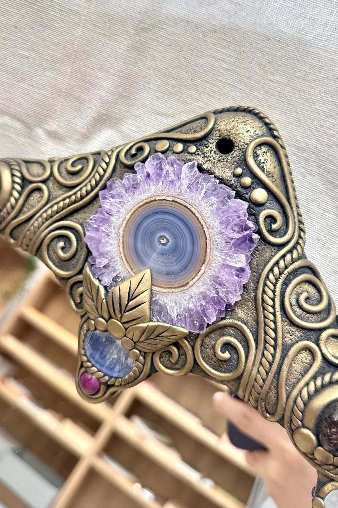 Handmade crystal mirror with Amethyst, Labradorite, Rose Quartz, Charoite, Garnet, Ruby, Clear Quartz and Moonstone.